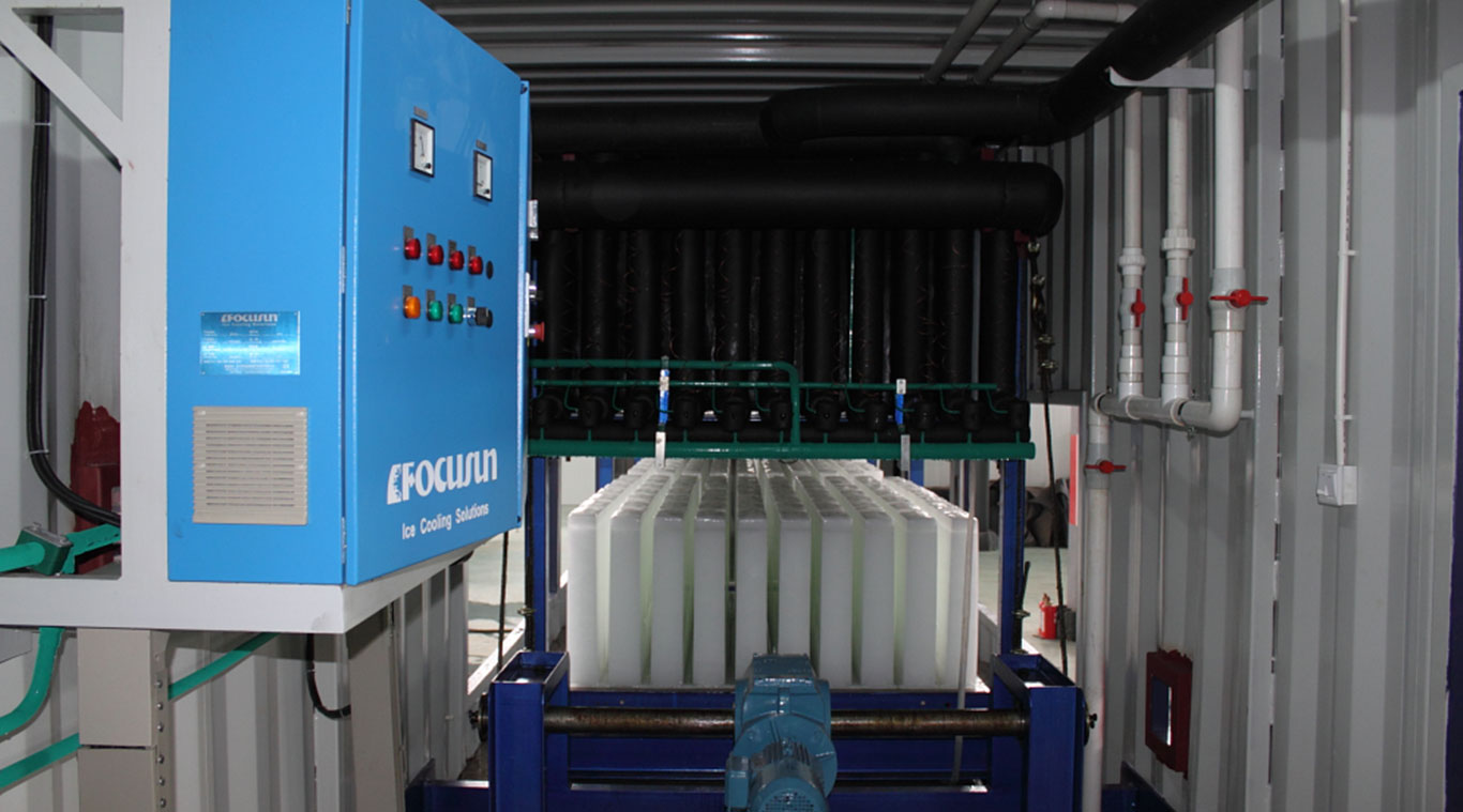 Containerized direct refrigeration block ice machine
